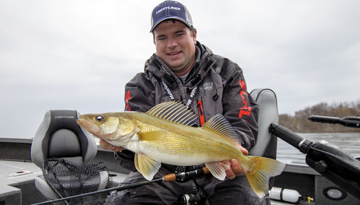 The author Jason Mitchell with a brilliant gold walleye.  High water cycle that has brought many new fishing opportunities across the upper Midwest over the past two decades.  In many cases, small water can fish big.